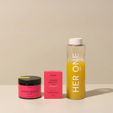 Das Starter Set der INNER BEAUTY Limited edition zeigt eine Dose mit einer pinken Verpackung und auf der rechten Seite eine Flasche mit einer gelben Flüssigkeit.