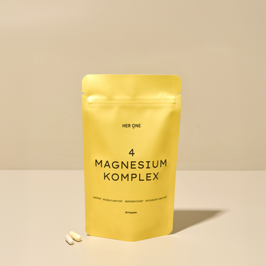 Yellow bag HER ONE 4 MAGNESIUM COMPLEX capsules for muscles, nervous system, and mental health.
