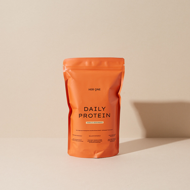 Unser veganes Daily Protein in seiner orangen Verpackung