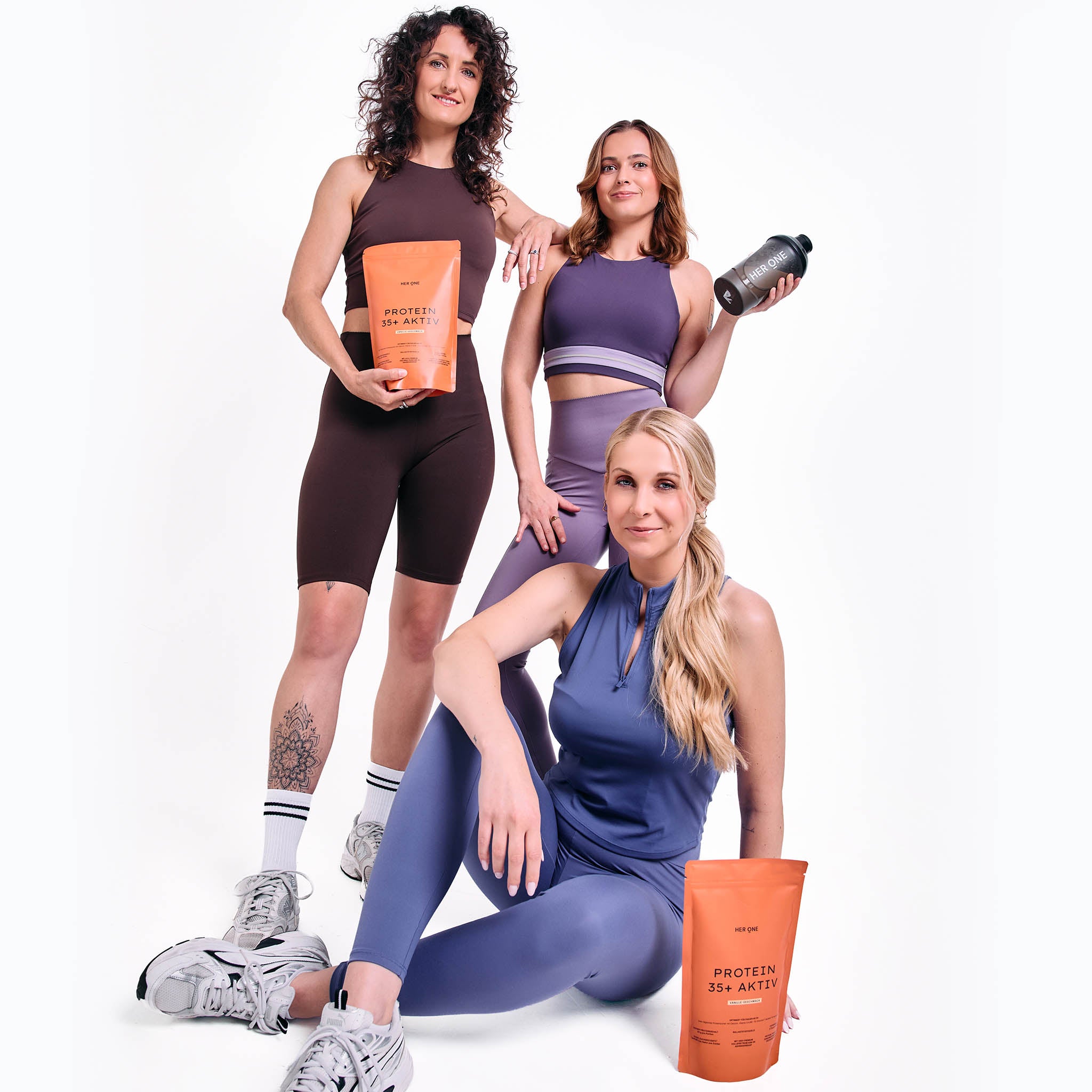 Trois femmes en tenue de sport avec HER ONE Protein 35+ Aktiv