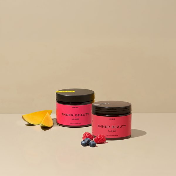 Zwei Dosen HER ONE INNER BEAUTY mit Mango und Beeren (Blaubeeren und Himbeeren).