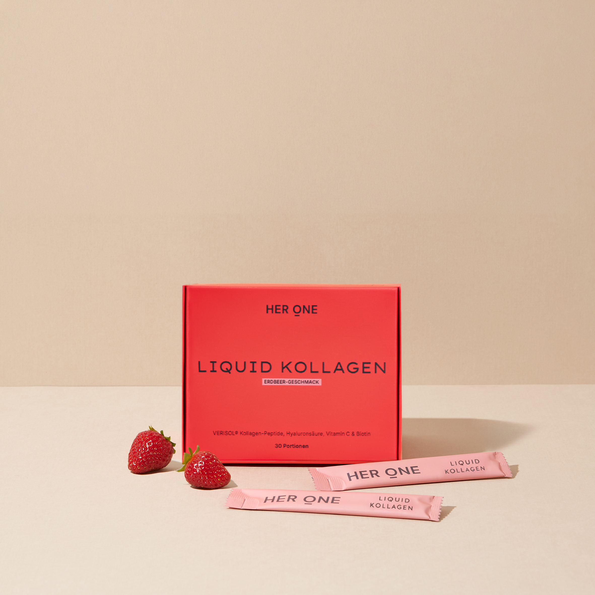 HER ONE Liquid Kollagen Box Erdbeer-Geschmack 30 Portionen mit Sachets und frischen Erdbeeren