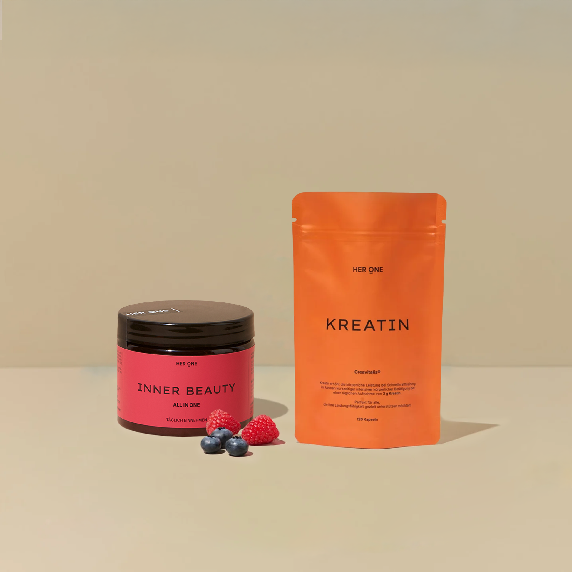 Can of INNER BEAUTY orange bag of CREATINE with capsules, plus berries.