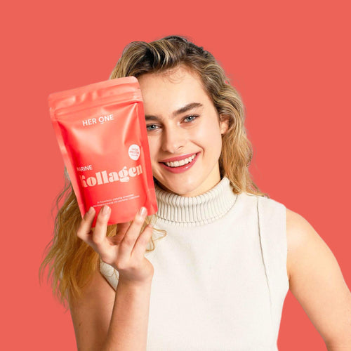A woman smiles and holds a red package labeled "Marine Collagen" against a red background.
