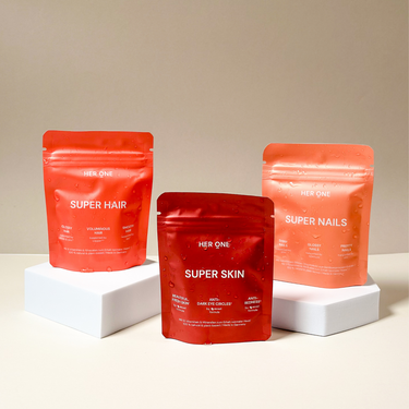 Three red stand-up pouches labeledSuper Hair",Super Skin" andSuper Nails" on white bases.