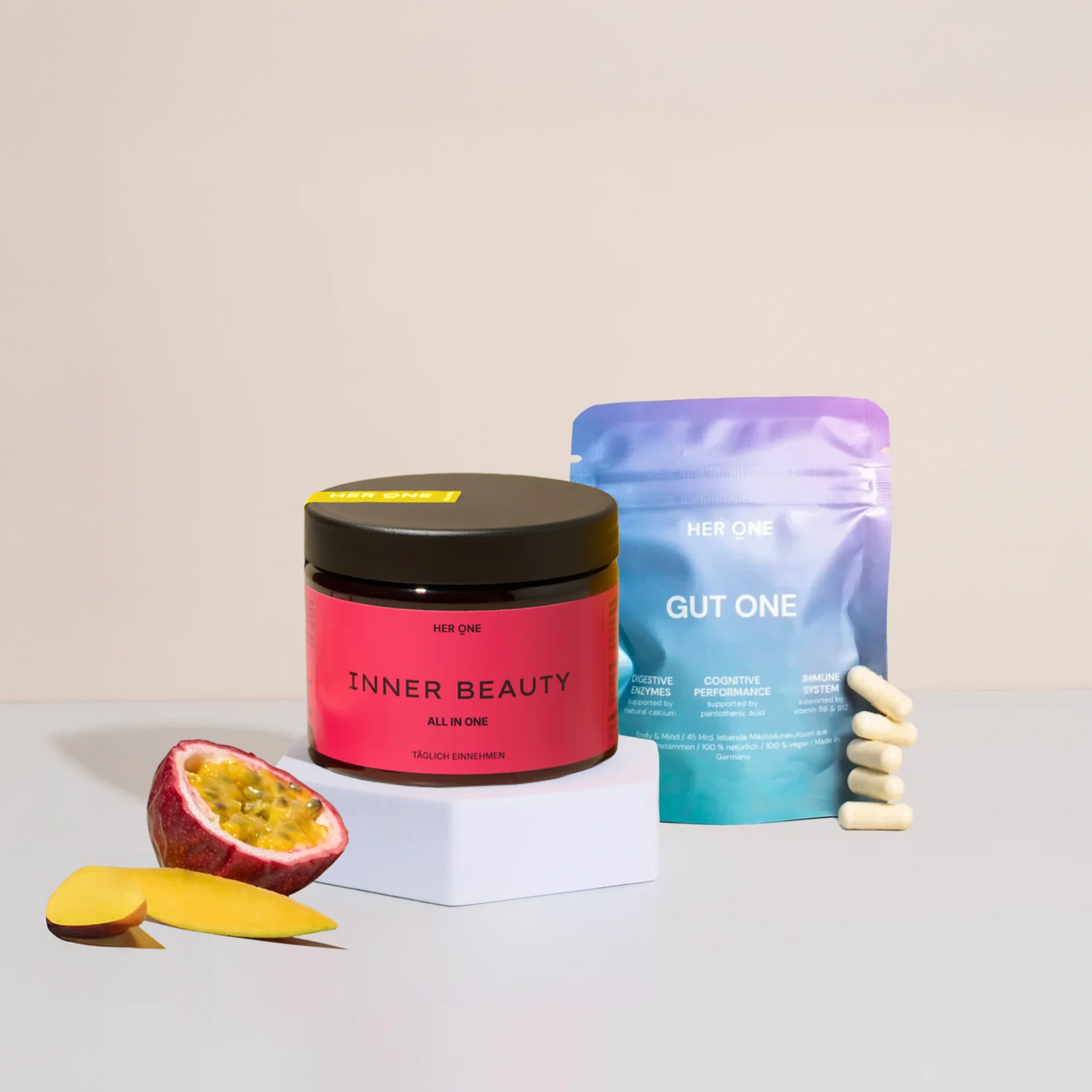 INNER BEAUTY tin INNER BEAUTY  GUT ONE with capsules, plus passion fruit and mango.