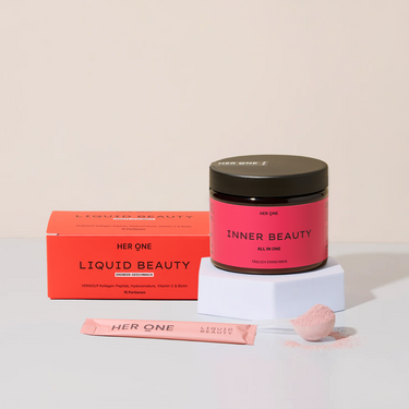HER ONE Beauty Deluxe Duo : Liquid Beauty Fraise et Inner Beauty All in One, avec poudre rose sur fond clair